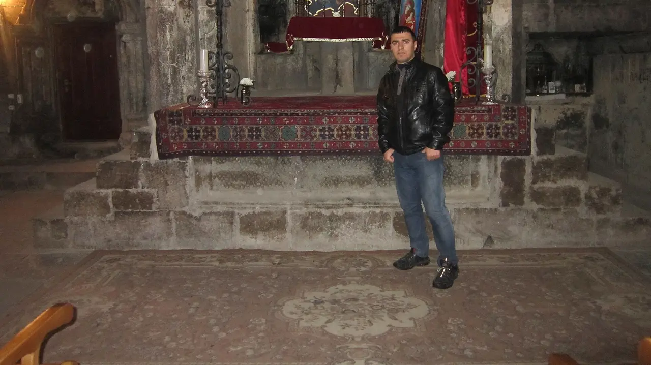 The monastery of Saghmosavank standing on the edge of the deep Kasagh river gorge under Mount Aragats