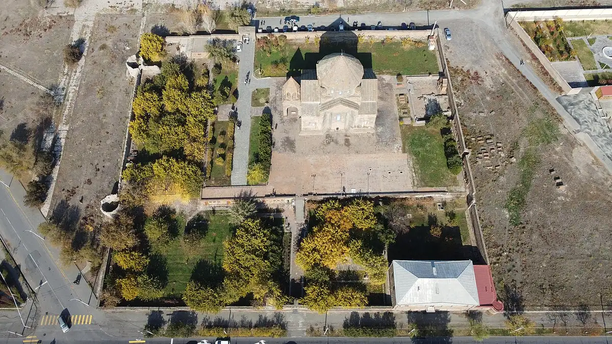Drone view of Saint Hripsime Church with its conical dome and cross-shaped plan in Vagharshapat