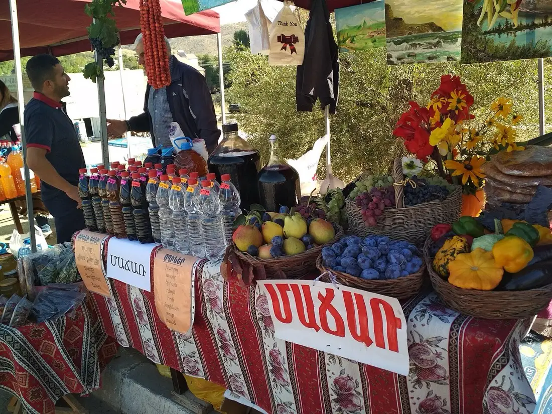 Festival stalls and visitors along the village road at the Areni Wine Festival
