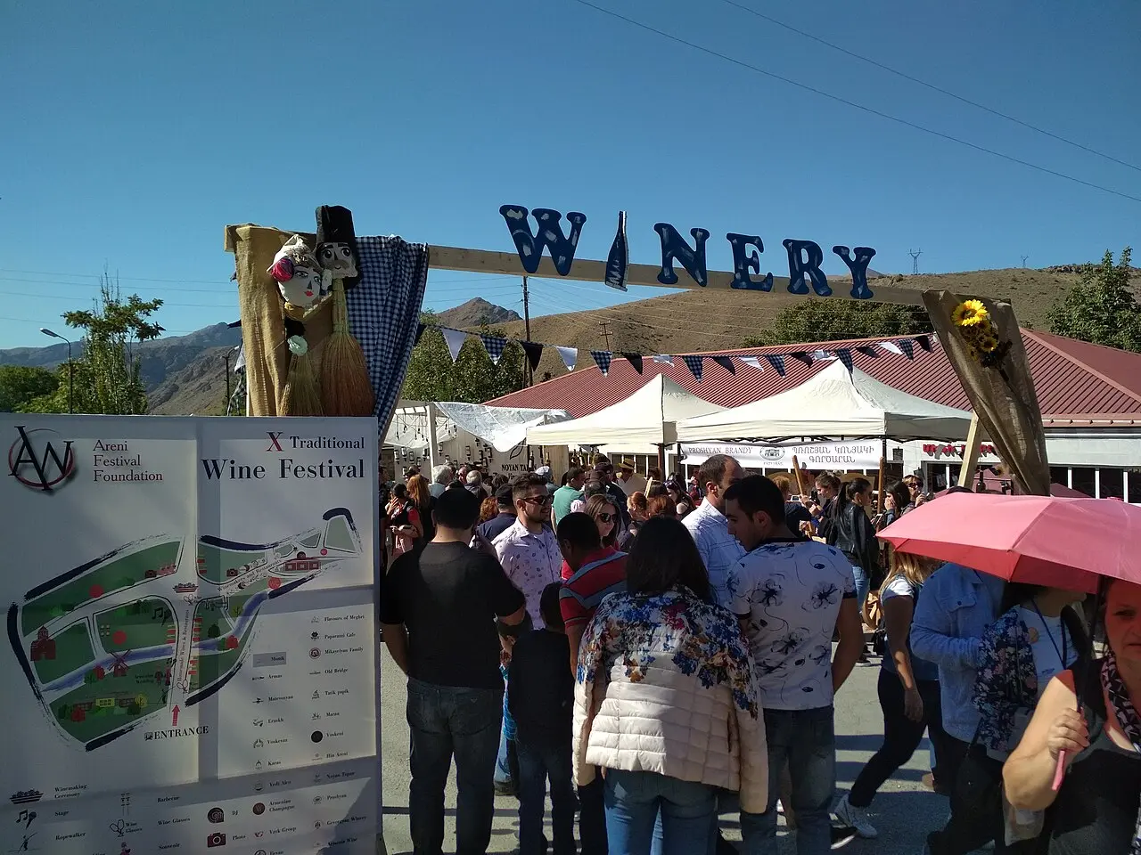 Crowds tasting wine at outdoor stalls during the Areni Wine Festival