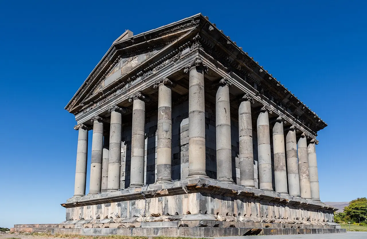 The colonnaded first-century Roman temple of Garni standing against a clear blue sky in Kotayk province