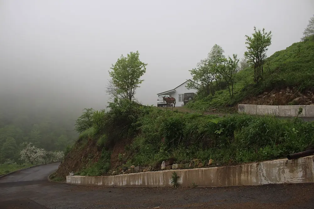 The town of Dilijan among green forested mountains in Tavush province