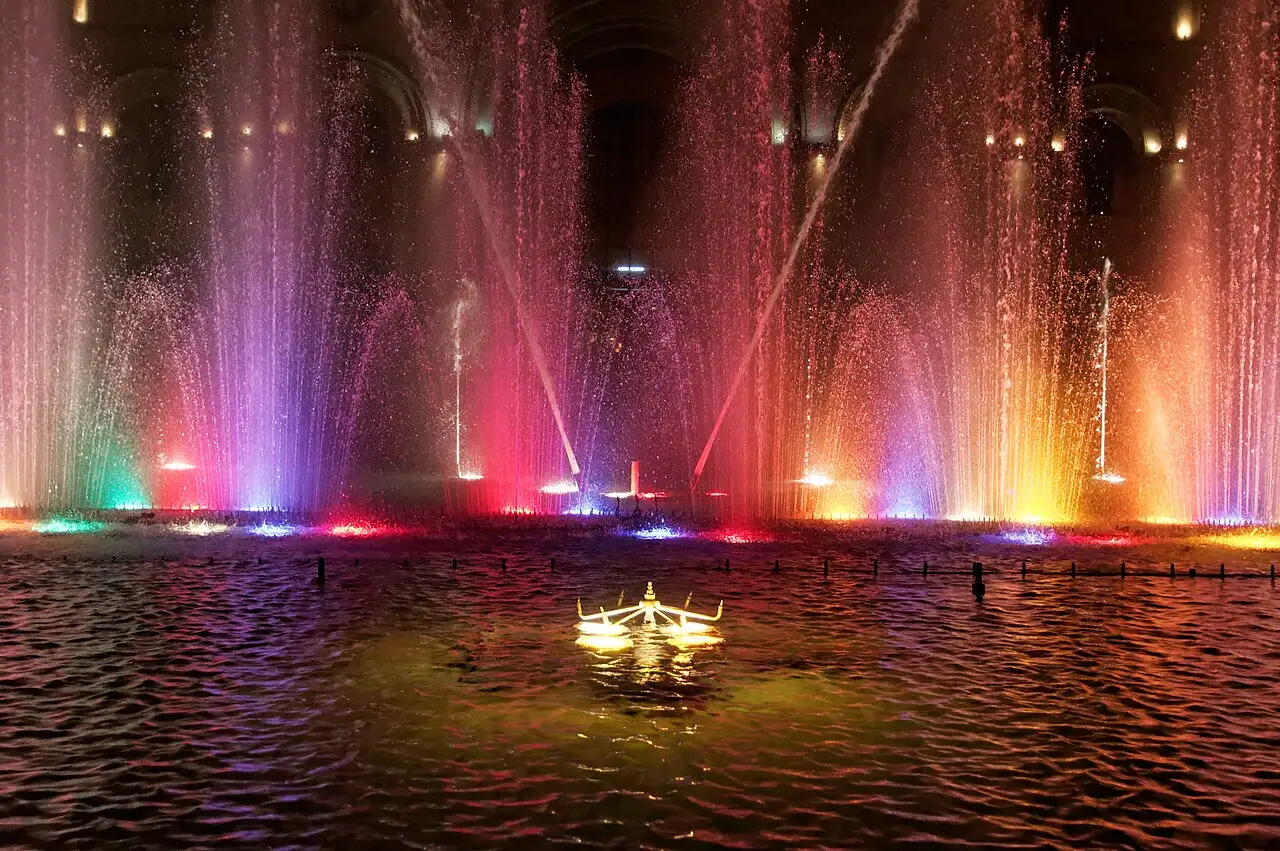 Coloured musical fountains playing on Republic Square in Yerevan on a summer night