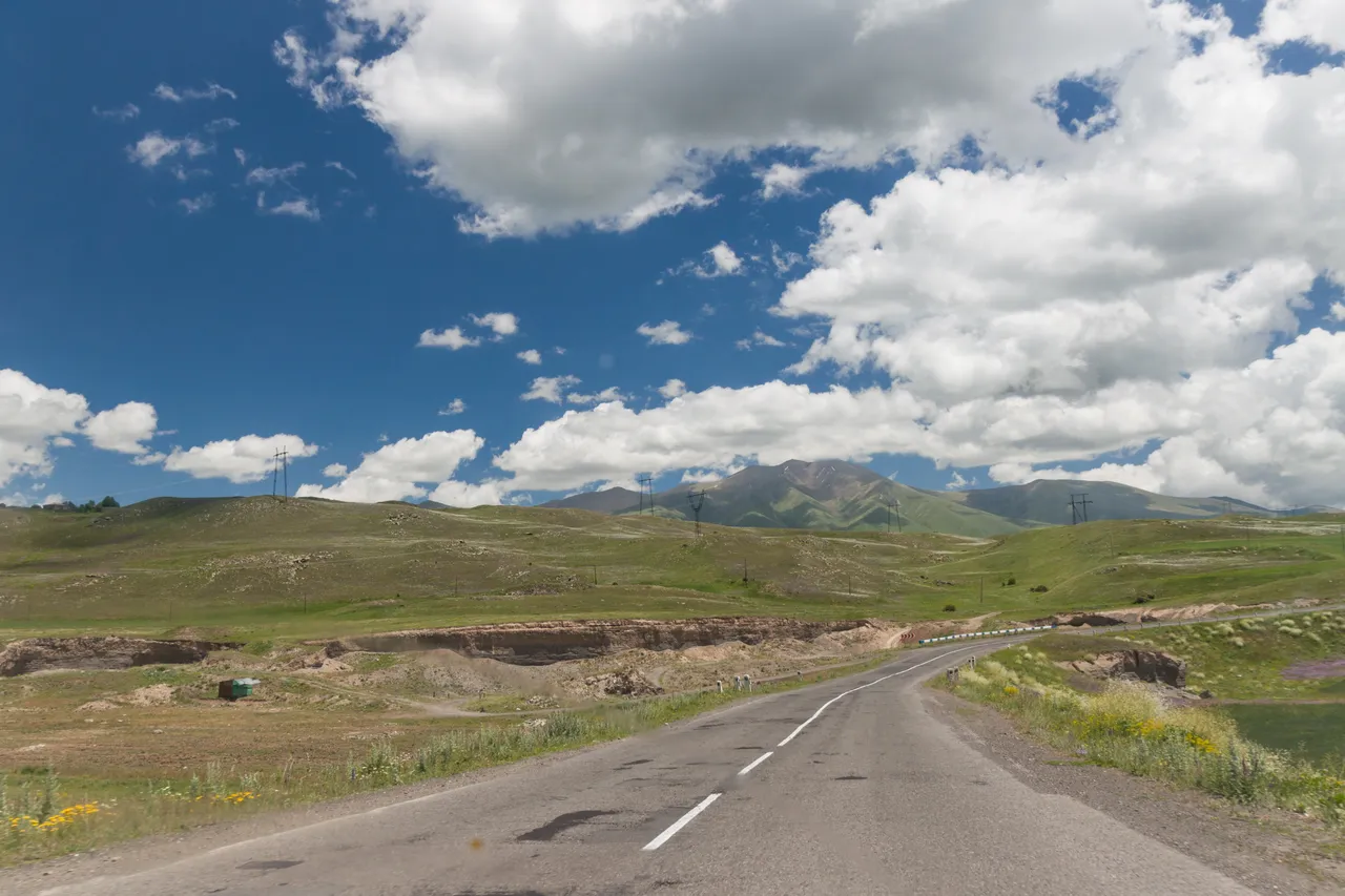 The M2 highway winding through fog in the mountains between Goris and Kapan in southern Armenia