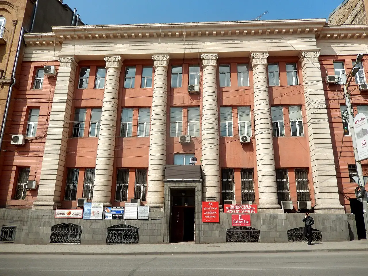 Stone apartment buildings lining Nalbandyan Street in central Yerevan