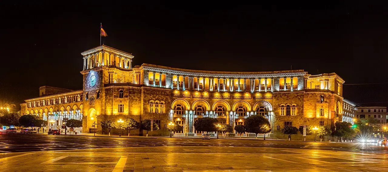 A wide HDR view over Republic Square and central Yerevan with pink tufa buildings and mountains on the horizon