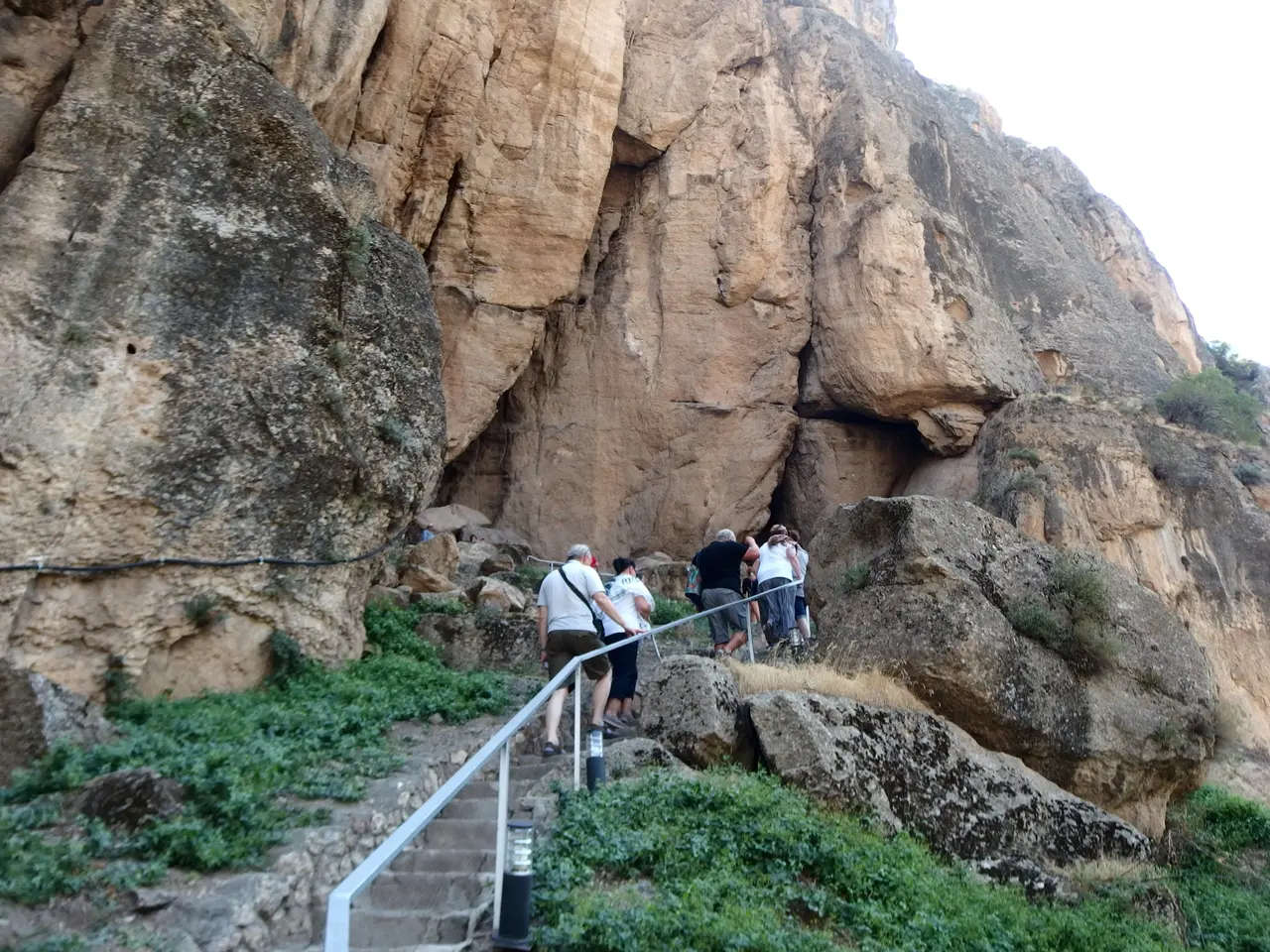 The mouth of the Areni-1 cave in a cliff above the Arpa river in Vayots Dzor