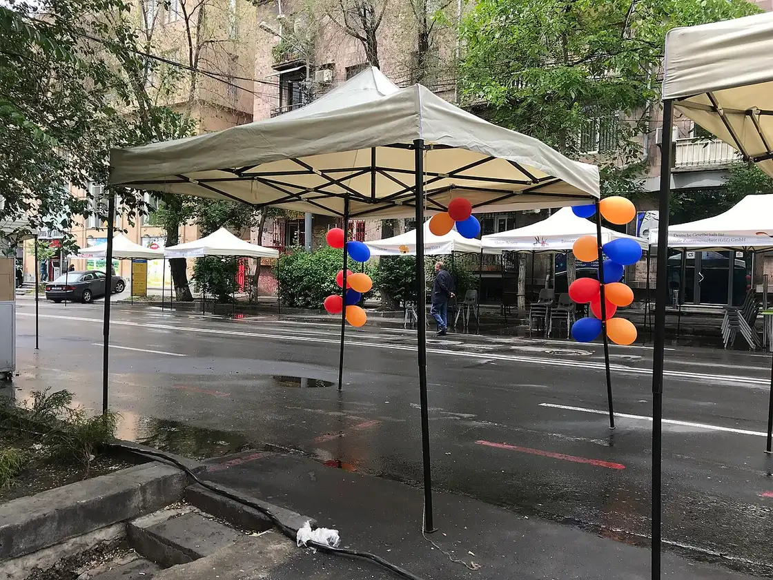 Saryan Street in Yerevan decorated in the colours of the Armenian flag, lined with open-air wine bars