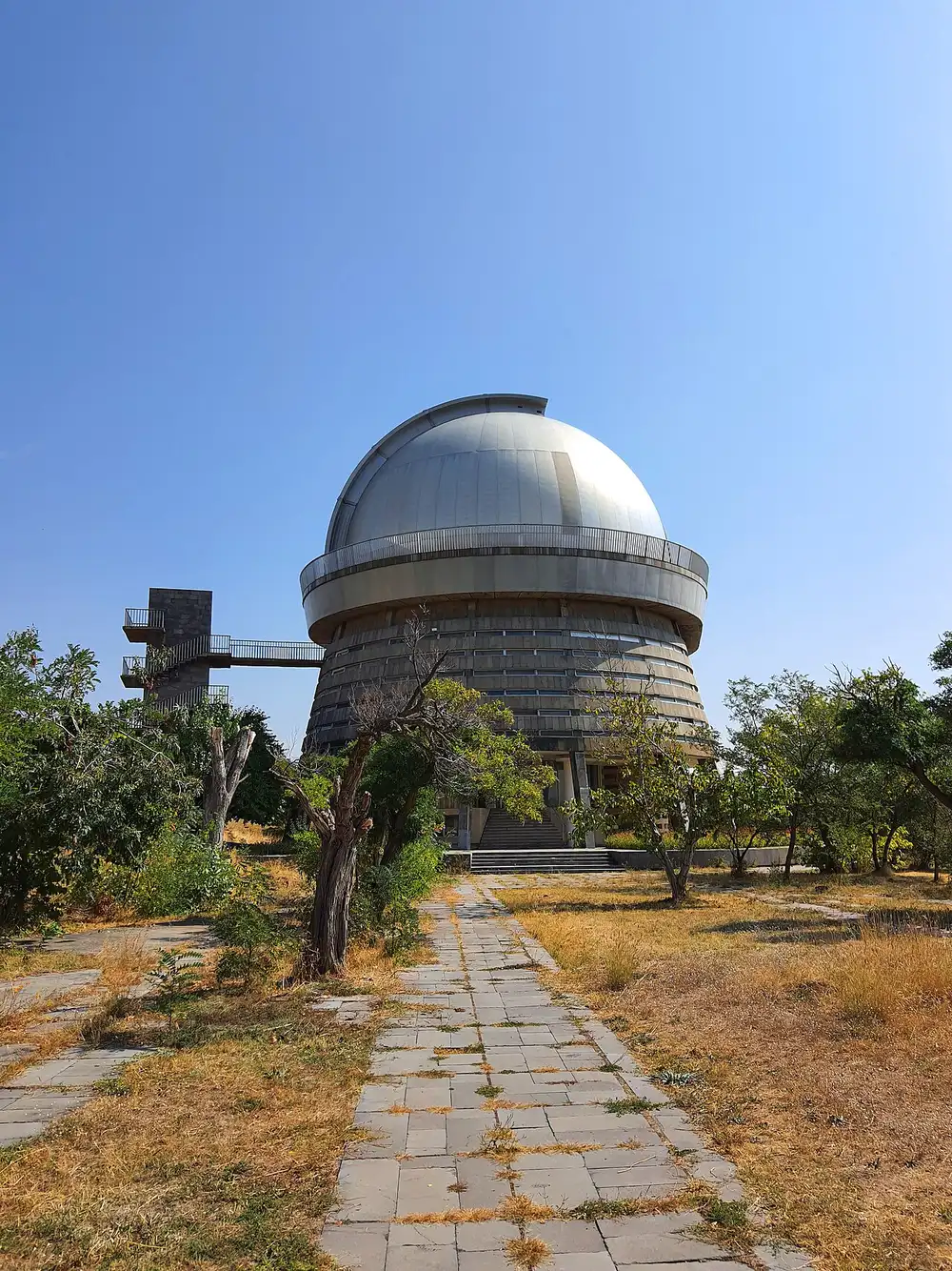 The exterior of a telescope building at Byurakan Observatory under open sky