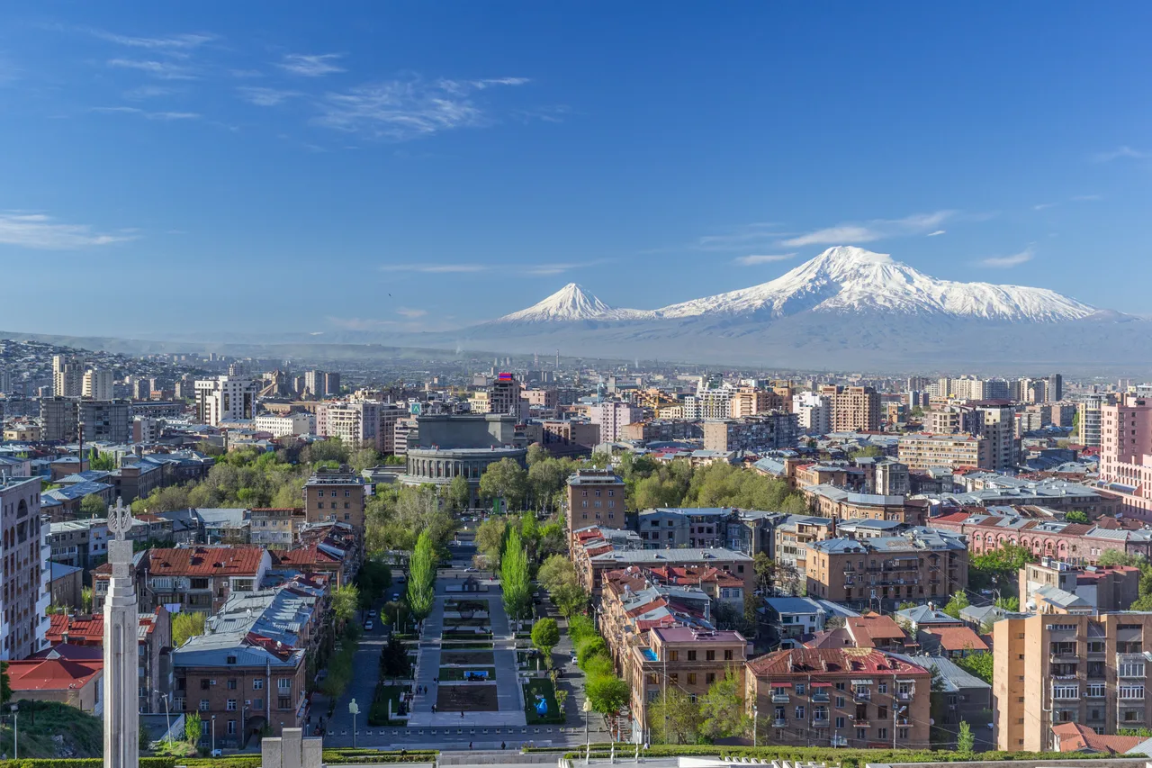 The Yerevan skyline in spring with Mount Ararat behind it, seen from the Cascade