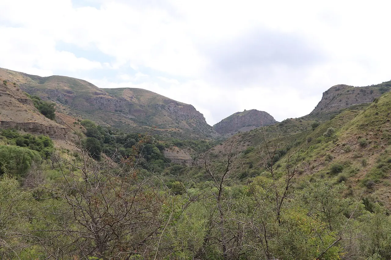 Rocky cliffs and green scrub in Khosrov Forest State Reserve above the Azat canyon