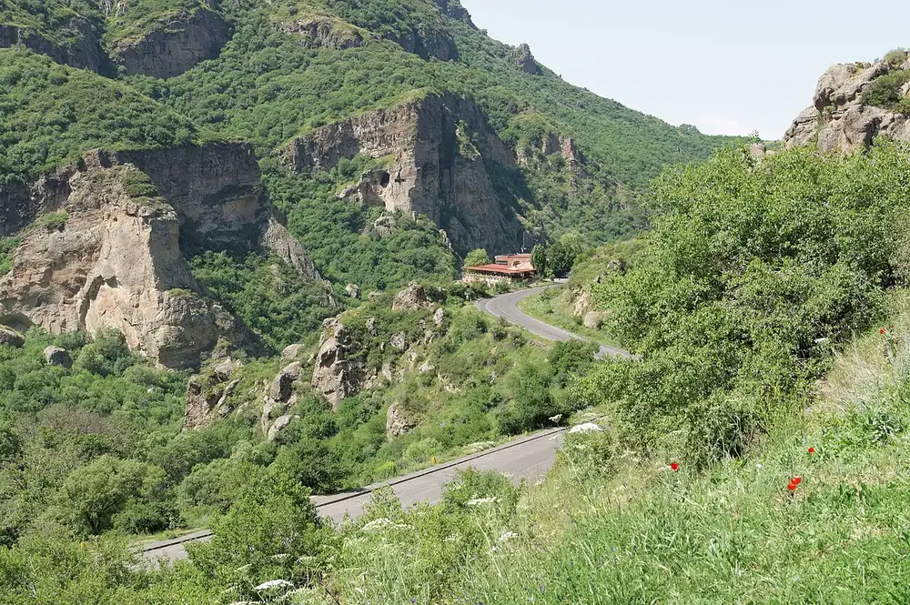 A road winding through the green Azat Valley gorge near Geghard monastery in Armenia