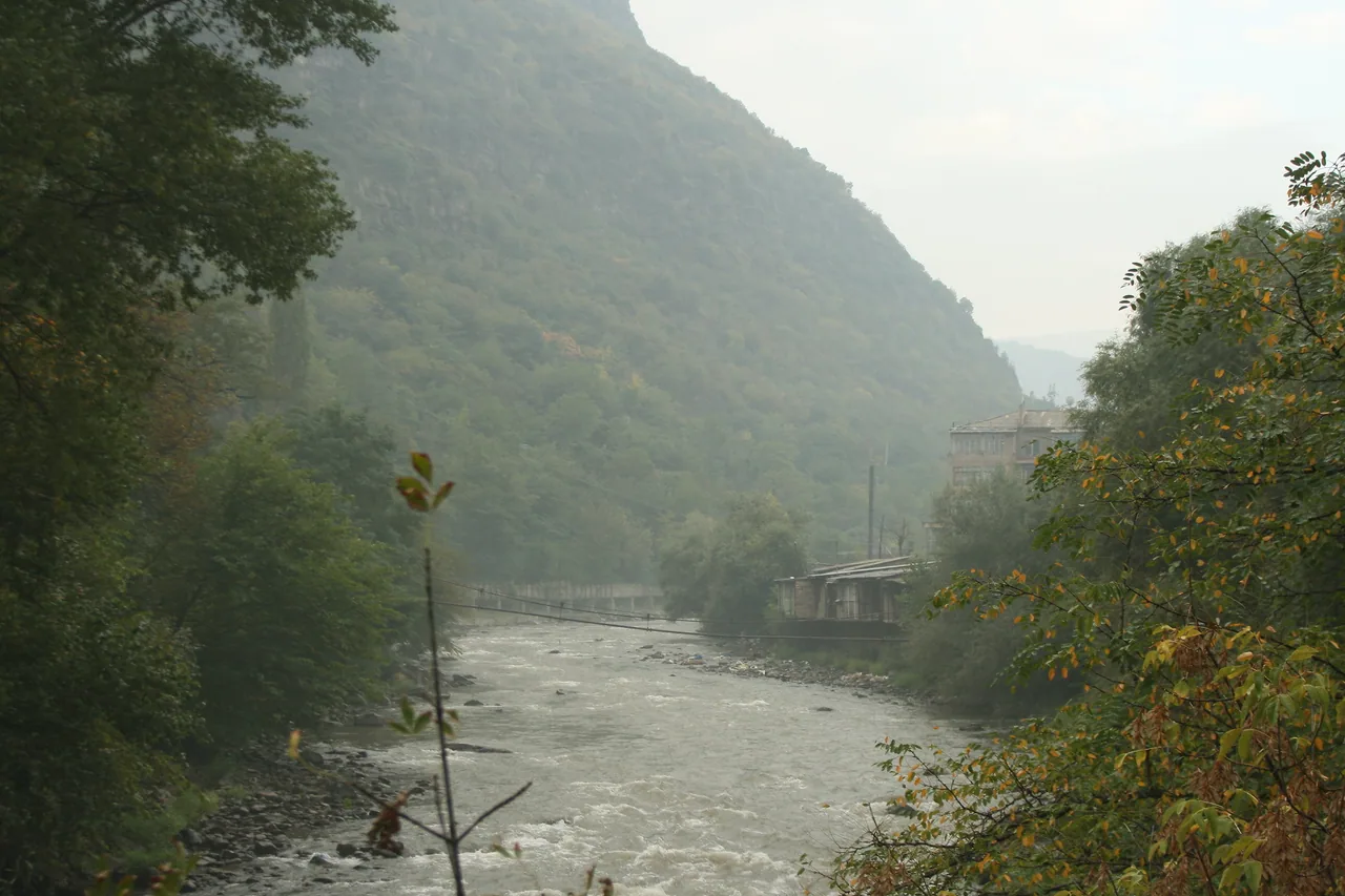 A road running along the floor of the Debed gorge past the industrial town of Alaverdi in northern Armenia