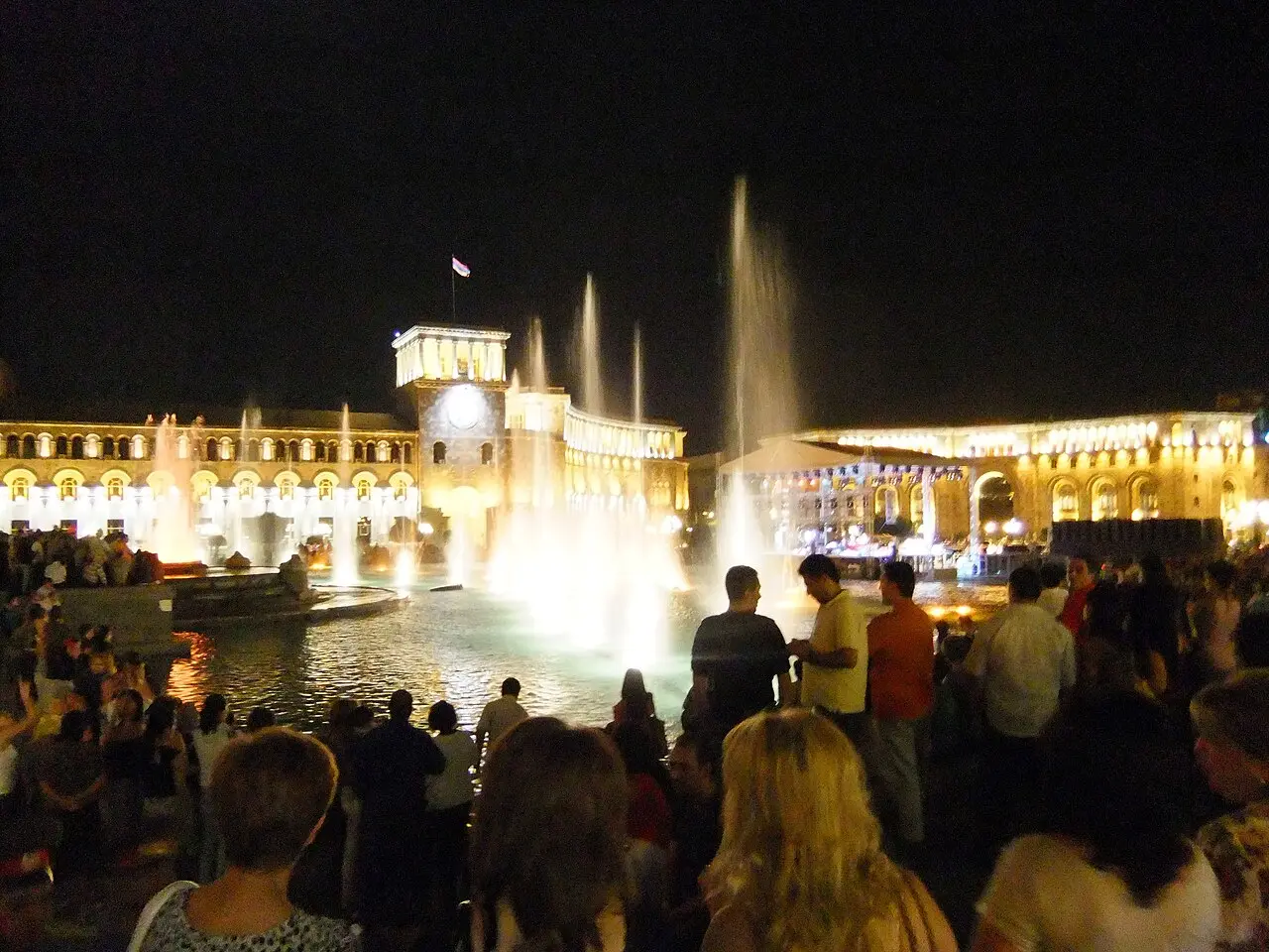 Musical fountains lit up on Republic Square in central Yerevan at night