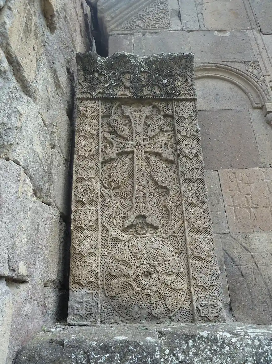The 1291 Goshavank khachkar carved by Poghos, its surface covered in dense layered lace-like stone openwork