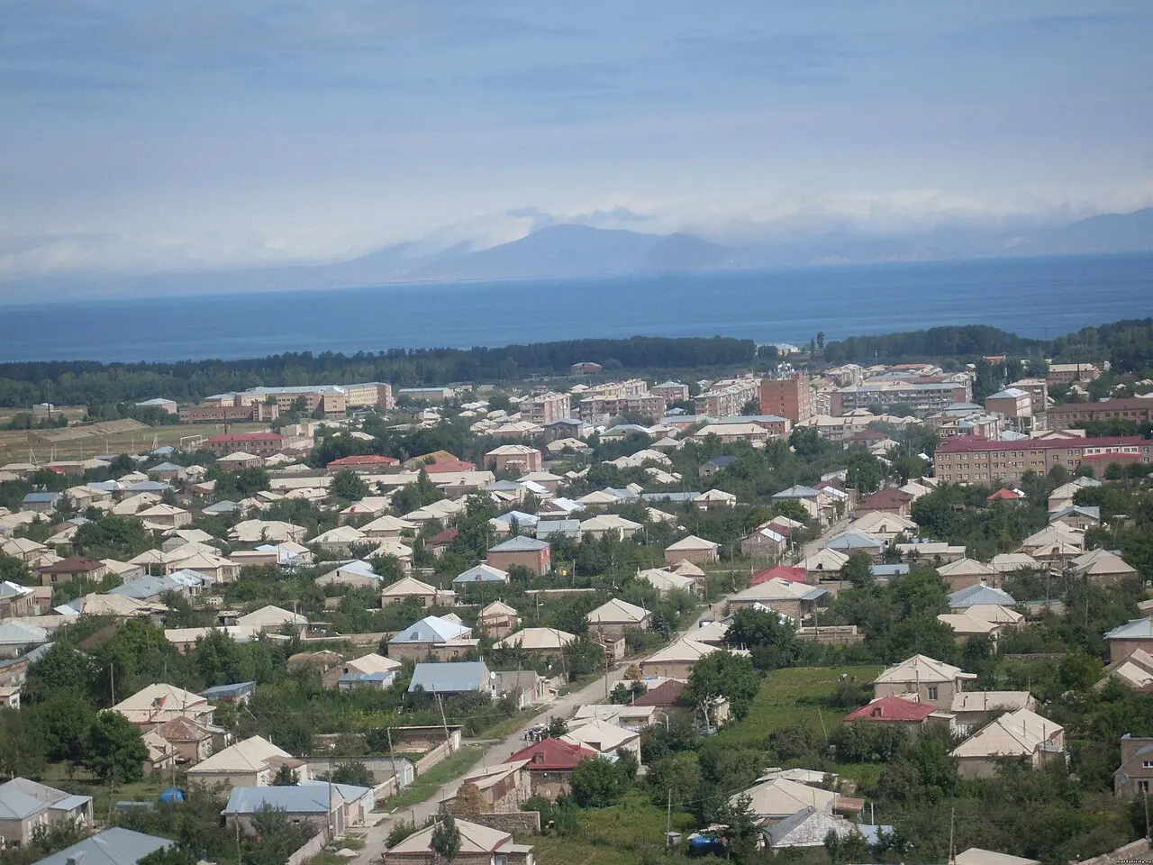 A quiet street in the south-shore town of Martuni with the Gegharkunik hills beyond