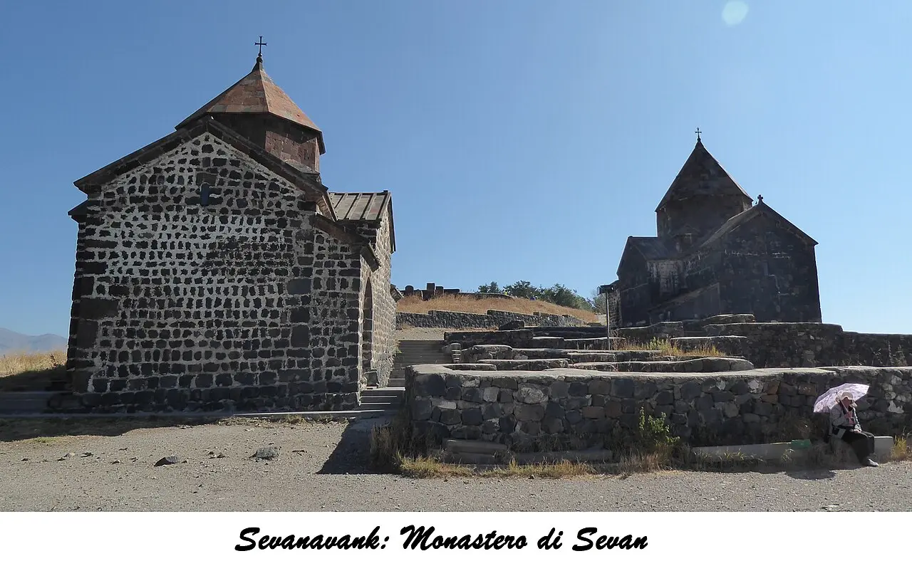 The churches of Sevanavank monastery on their headland above Lake Sevan under a bright sky
