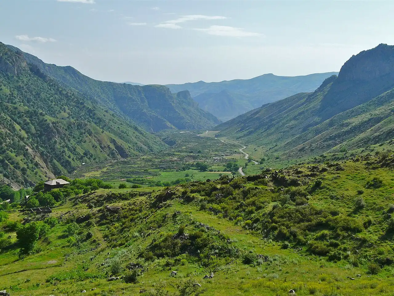 The green Yeghegis valley in Vayots Dzor framed by bare mountain ridges