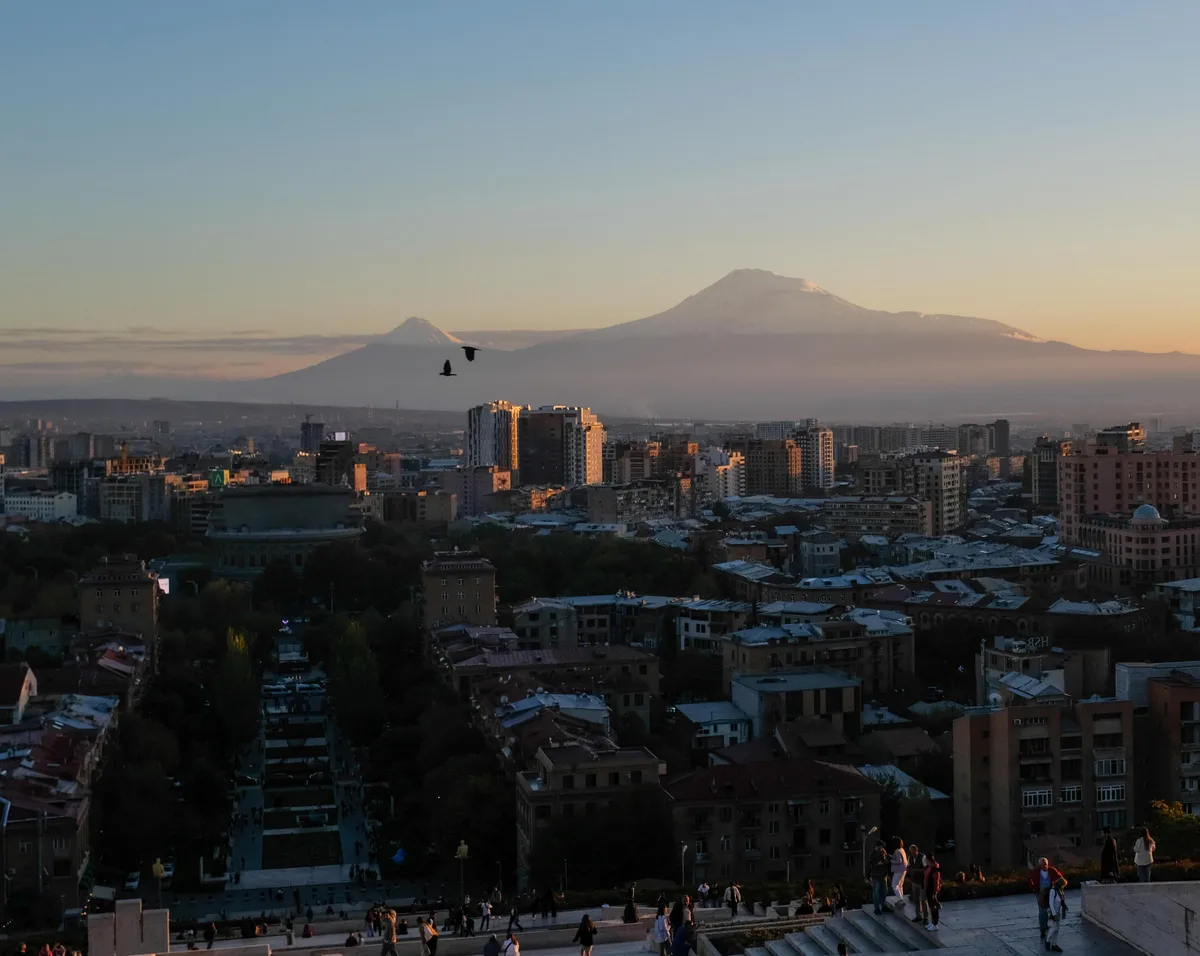 Mount Ararat floating above the Yerevan rooftops, seen from the terraces of the Cascade in the city centre