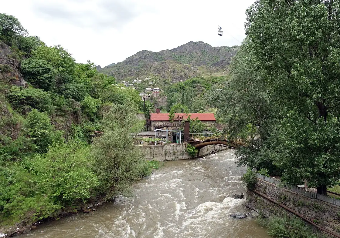 The Debed river at Alaverdi with the town cable car crossing above the green gorge