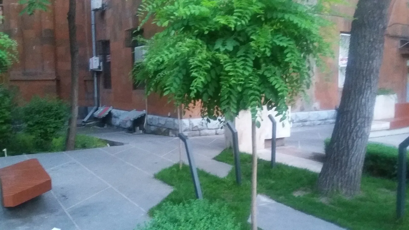 Marshal Baghramyan Avenue in Yerevan, a tree-lined residential boulevard of mid-rise stone apartment buildings