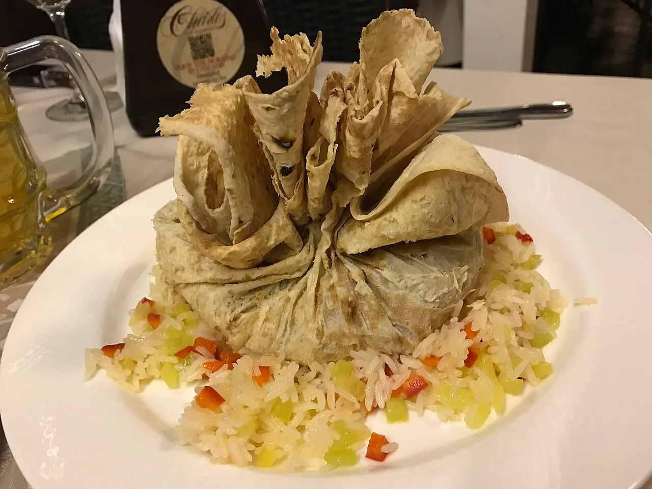 A plated dish served at a restaurant table in Yerevan