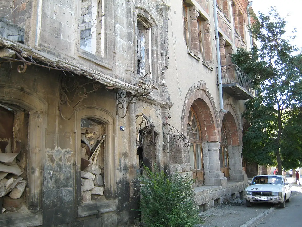 A 19th-century Alexandropol-style townhouse in black and red tuff with carved wrought-iron balconies in the Kumayri quarter of Gyumri