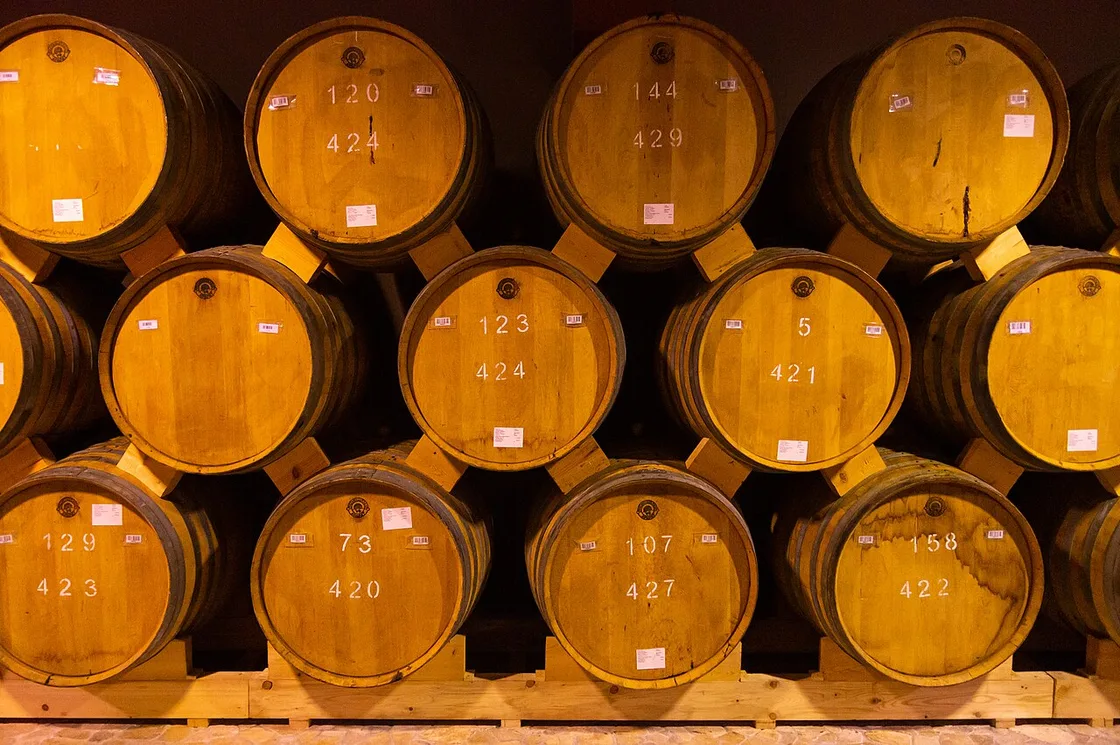 Rows of oak barrels ageing Armenian brandy in a cellar at the Ararat factory in Yerevan