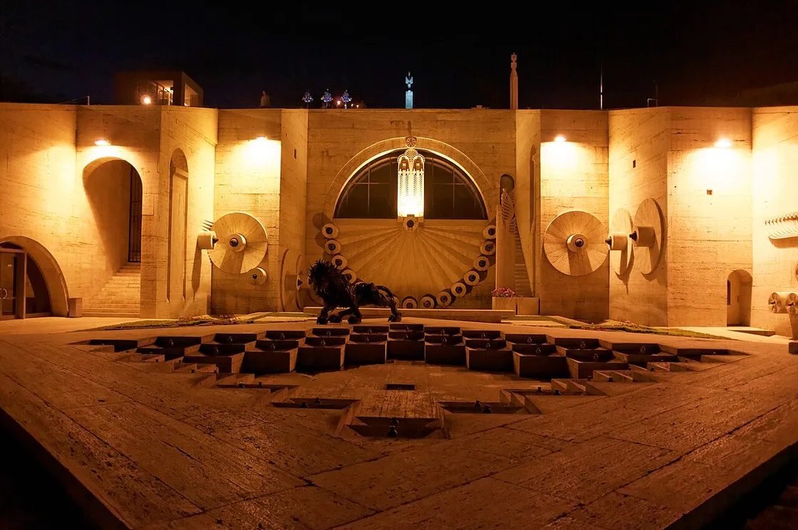The Yerevan Cascade lit up at night, its terraces glowing above the city