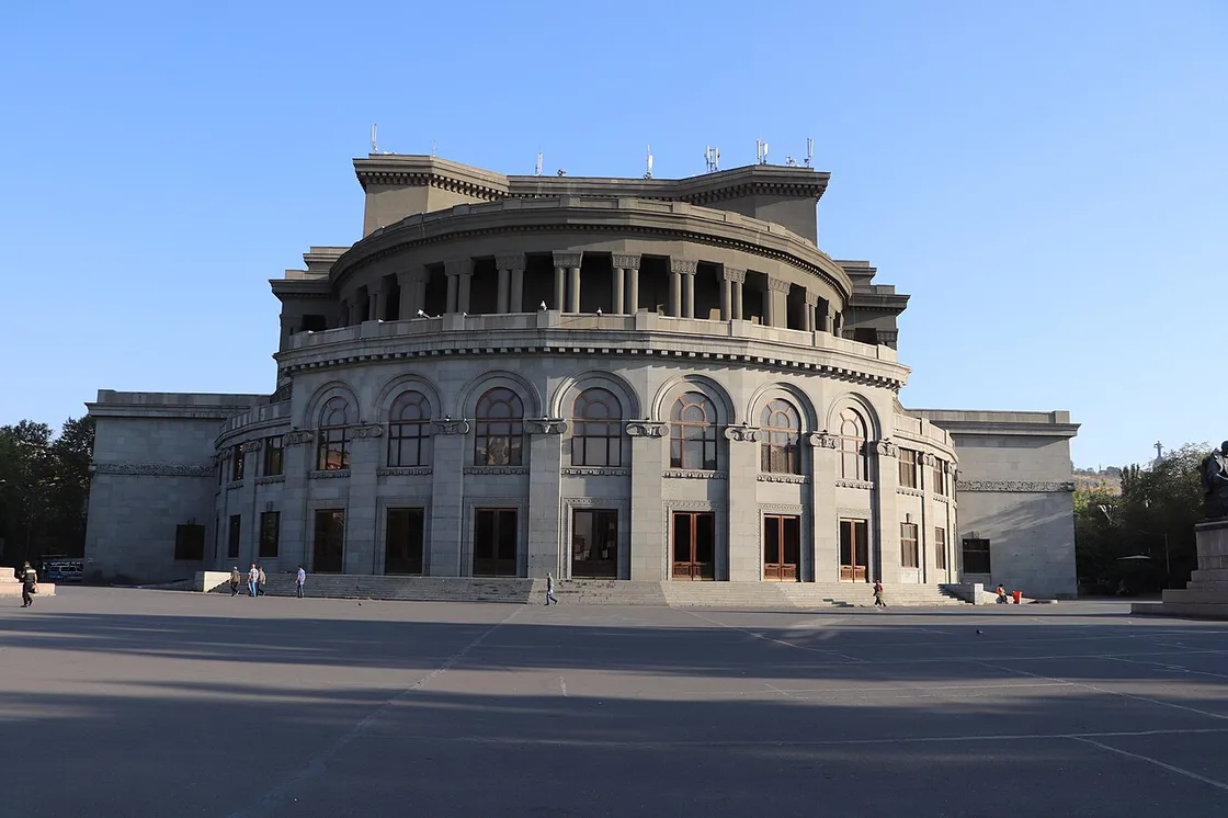 The rounded stone facade of the Yerevan Opera and Ballet Theatre