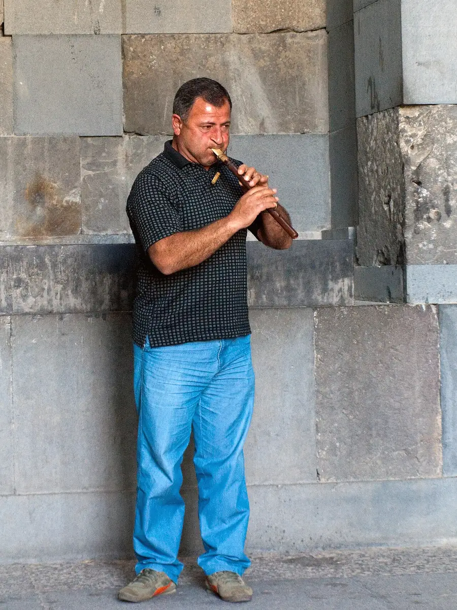 A musician playing the duduk, the Armenian apricot-wood reed pipe, at Garni