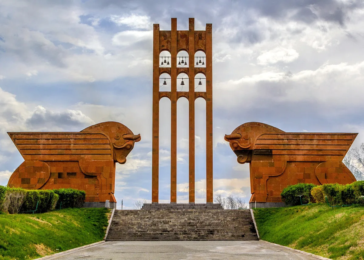 The huge winged oxen of red tufa flanking the entrance avenue of the Sardarapat Memorial