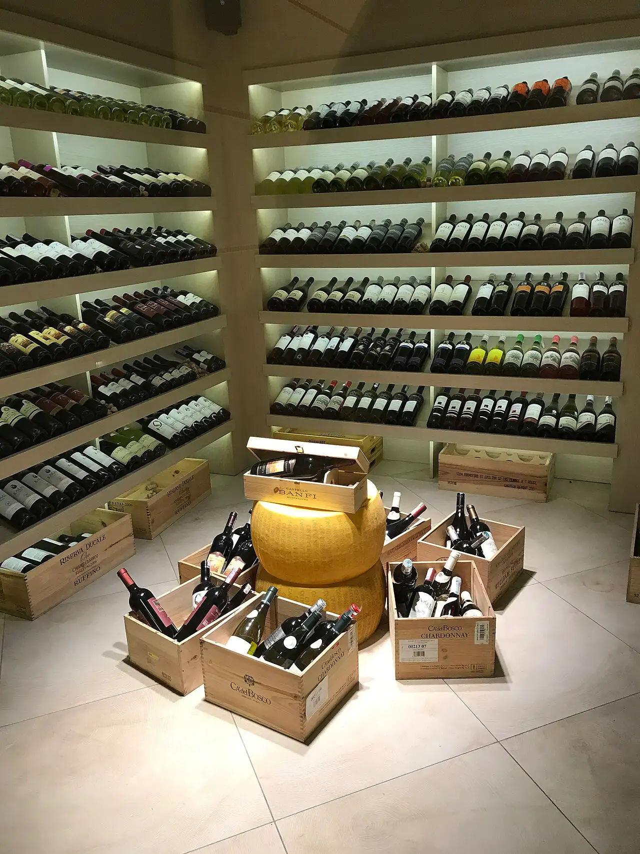 Shelves of wine bottles from mostly non-Armenian producers stacked in a Yerevan restaurant cellar
