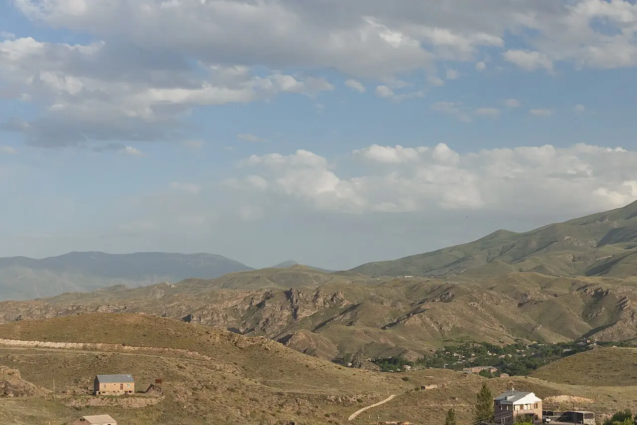 Rocky slopes falling towards the Arpa river valley on the road near Yeghegnadzor