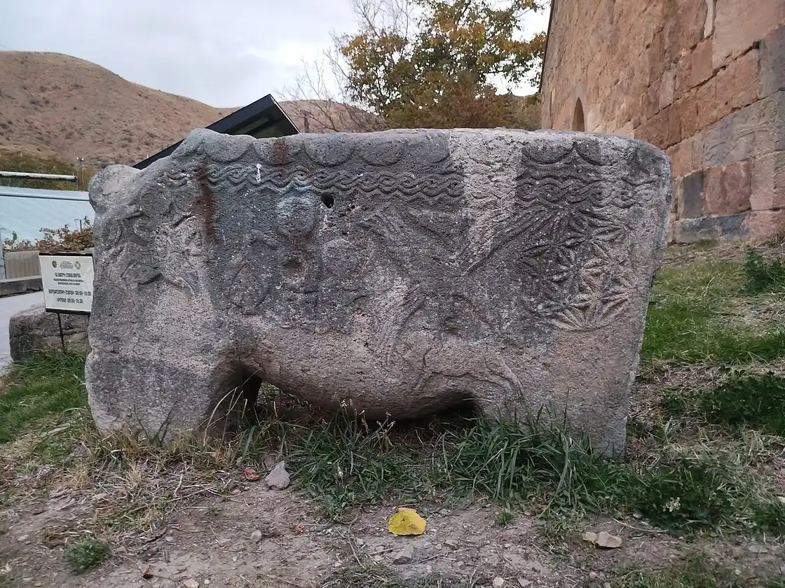 The stone church of Surb Hakob in Vernashen that houses the Gladzor University museum, khachkars in front
