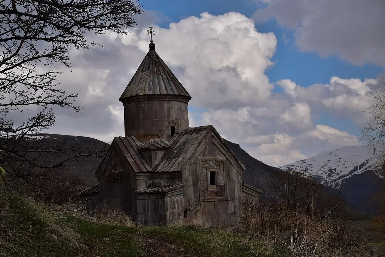 The churches of Tsakhats Kar monastery on an open mountainside above the Yeghegis valley