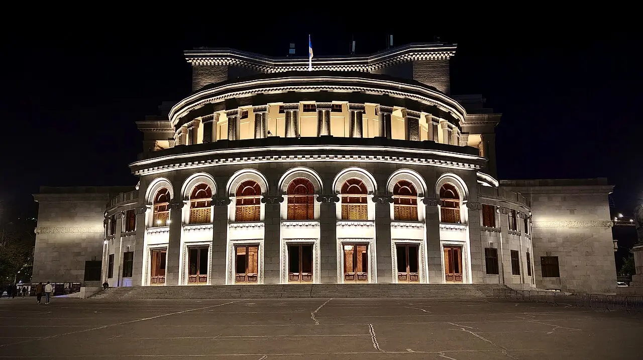 Yerevan Opera and Ballet Theatre lit up at night near the city centre bar district